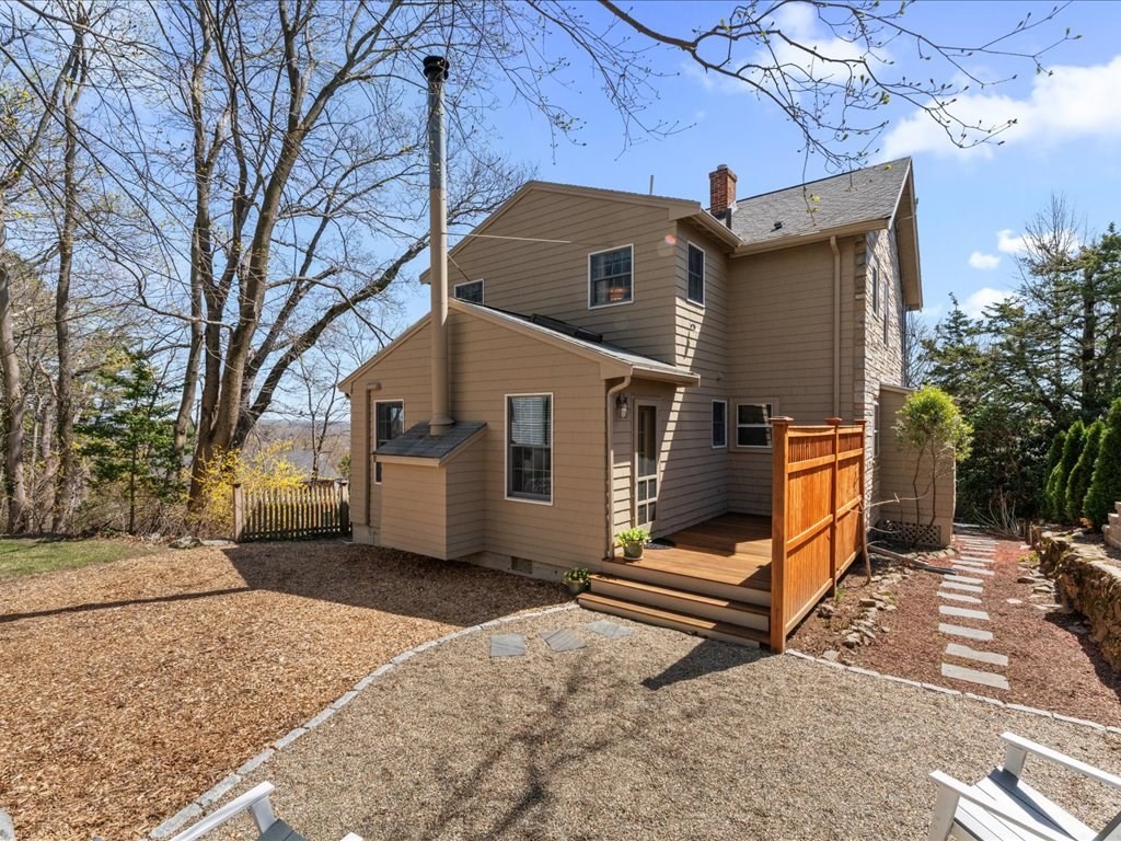 55 Coolidge Road Arlington, MA 02476 - Photo 33 of 42 a view of a house with a yard