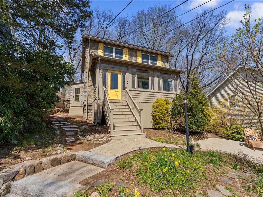 55 Coolidge Road Arlington, MA 02476 - Photo 35 of 42 a front view of a house with a yard
