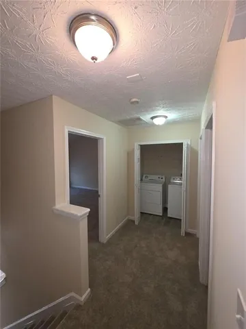 a bathroom with a sink toilet and mirror