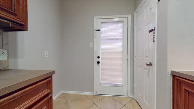 a kitchen with stainless steel appliances granite countertop a stove microwave and sink