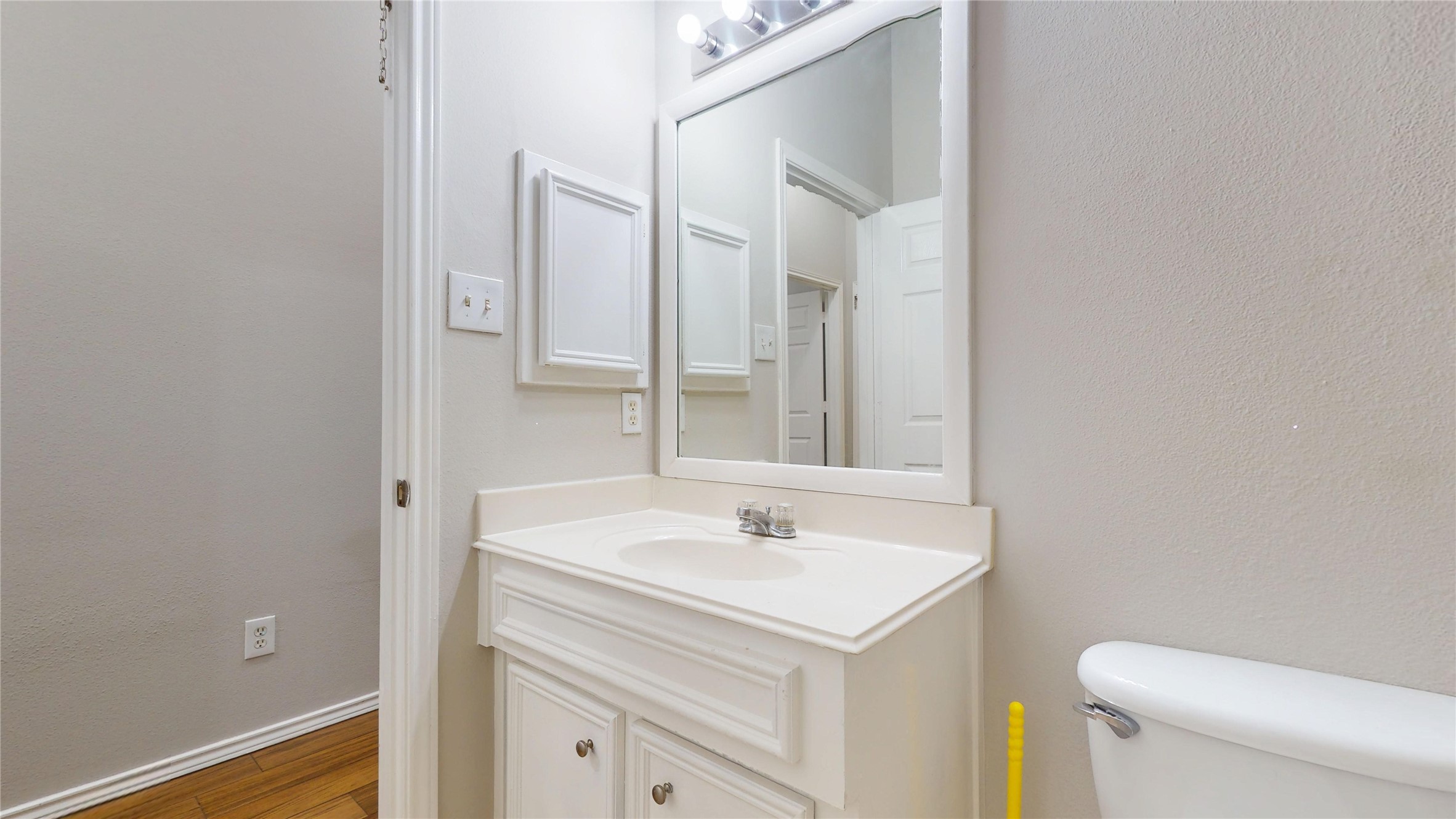 16611 Cheshire Grove Lane Houston, TX 77090 - Photo 30 of 40 a bathroom with a sink and a toilet