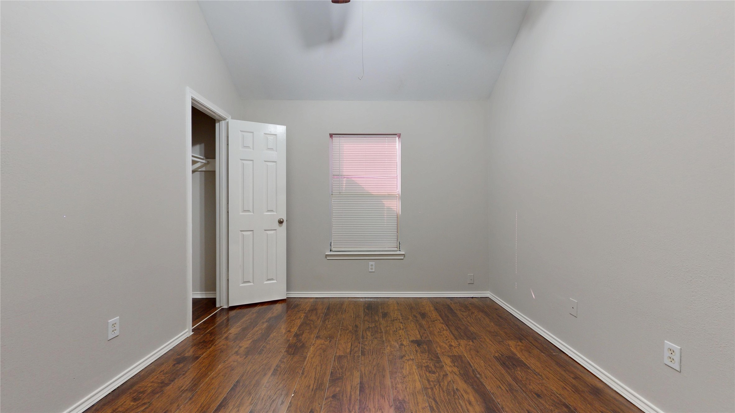 16611 Cheshire Grove Lane Houston, TX 77090 - Photo 35 of 40 a view of an empty room with wooden floor and a window
