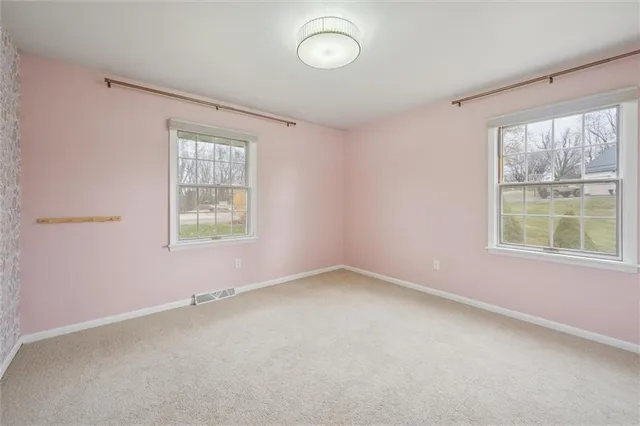 an empty room with a window
