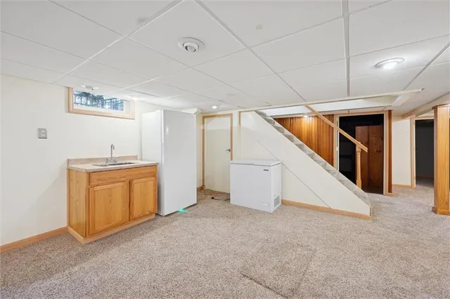 a view of an empty room with closet