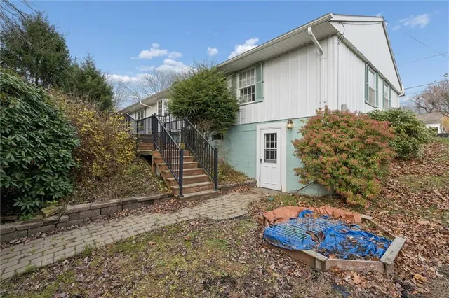 a house with trees in front of it