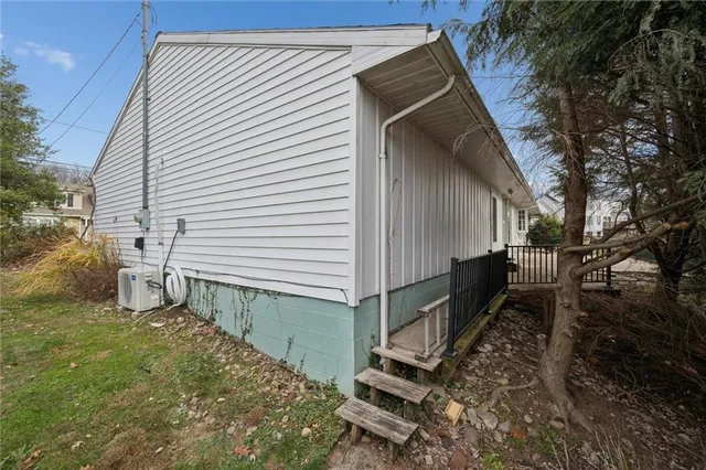 a view of a yard with a tree