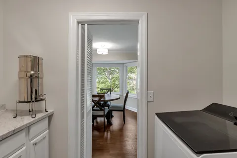 a view of a kitchen and dining room