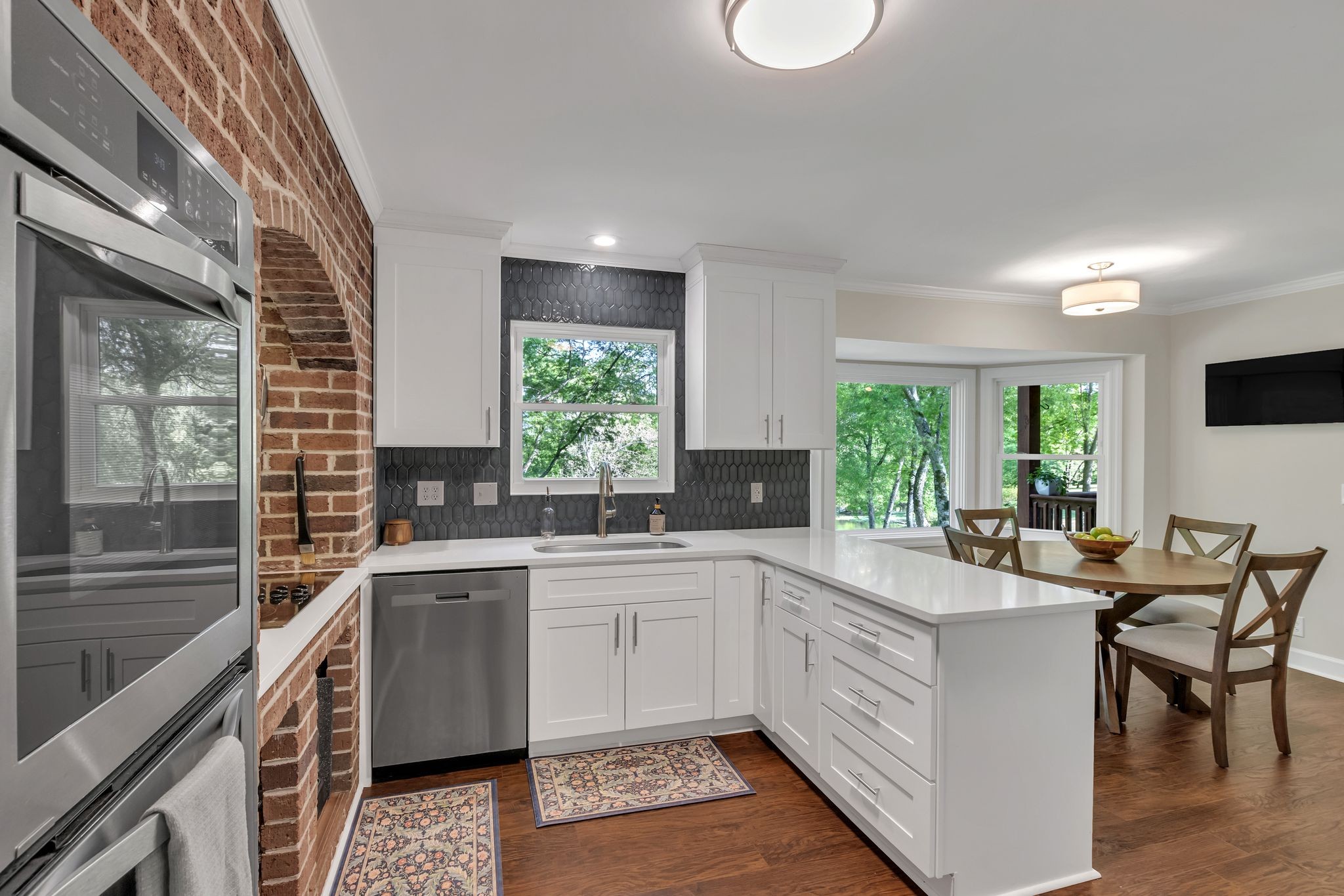 2248 Racquet Club Drive Murfreesboro, TN 37128 - Photo 13 of 41 a kitchen with a sink stove and cabinets