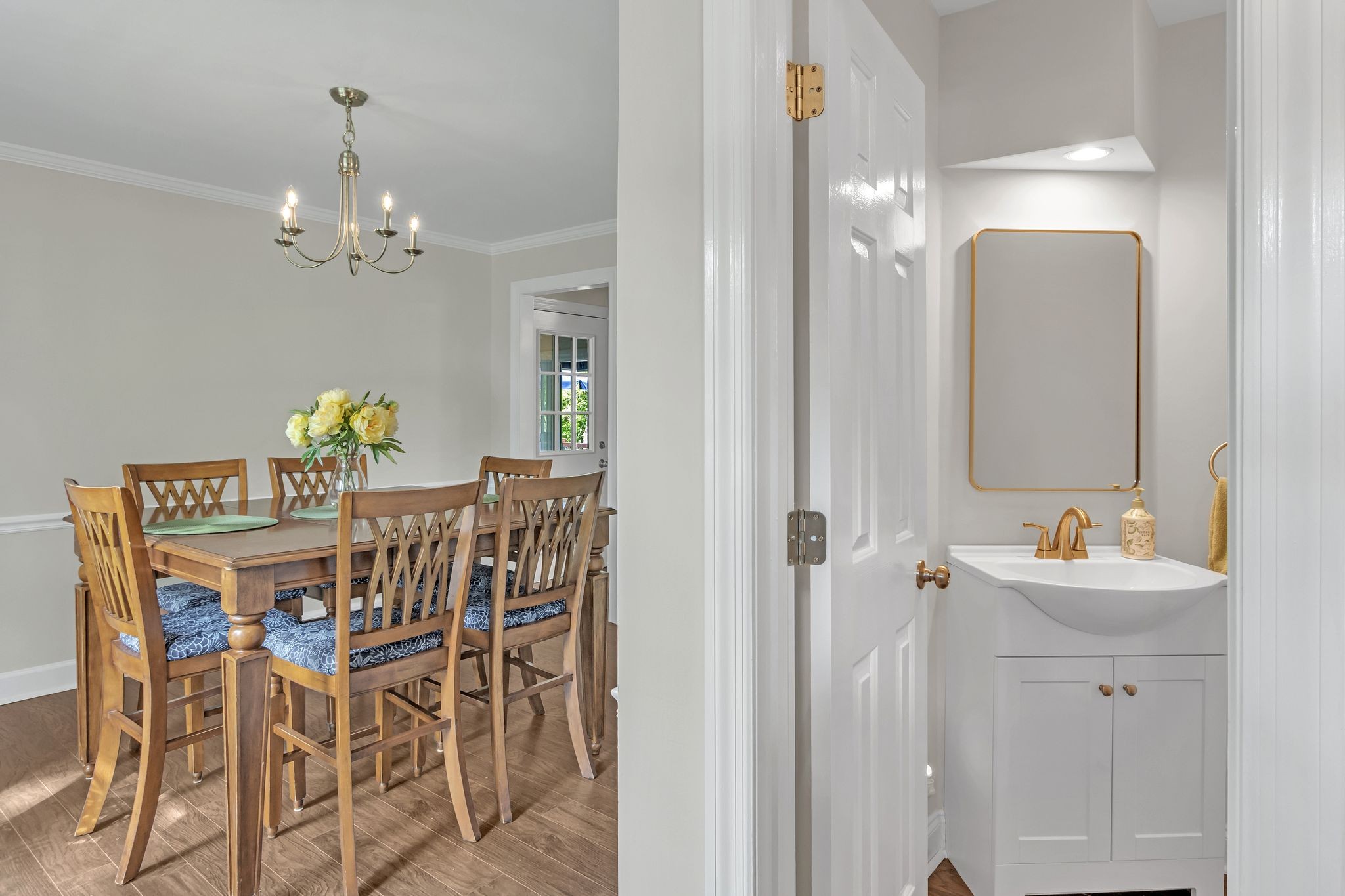 2248 Racquet Club Drive Murfreesboro, TN 37128 - Photo 16 of 41 a view of a dining room with furniture and chandelier