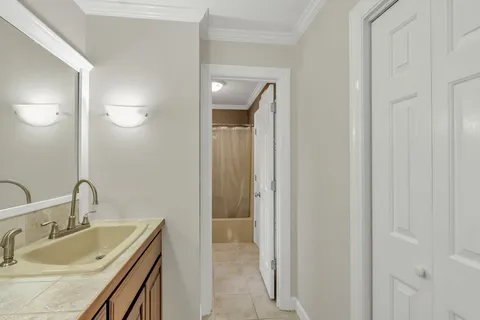 a bathroom with 2 sink and a mirror