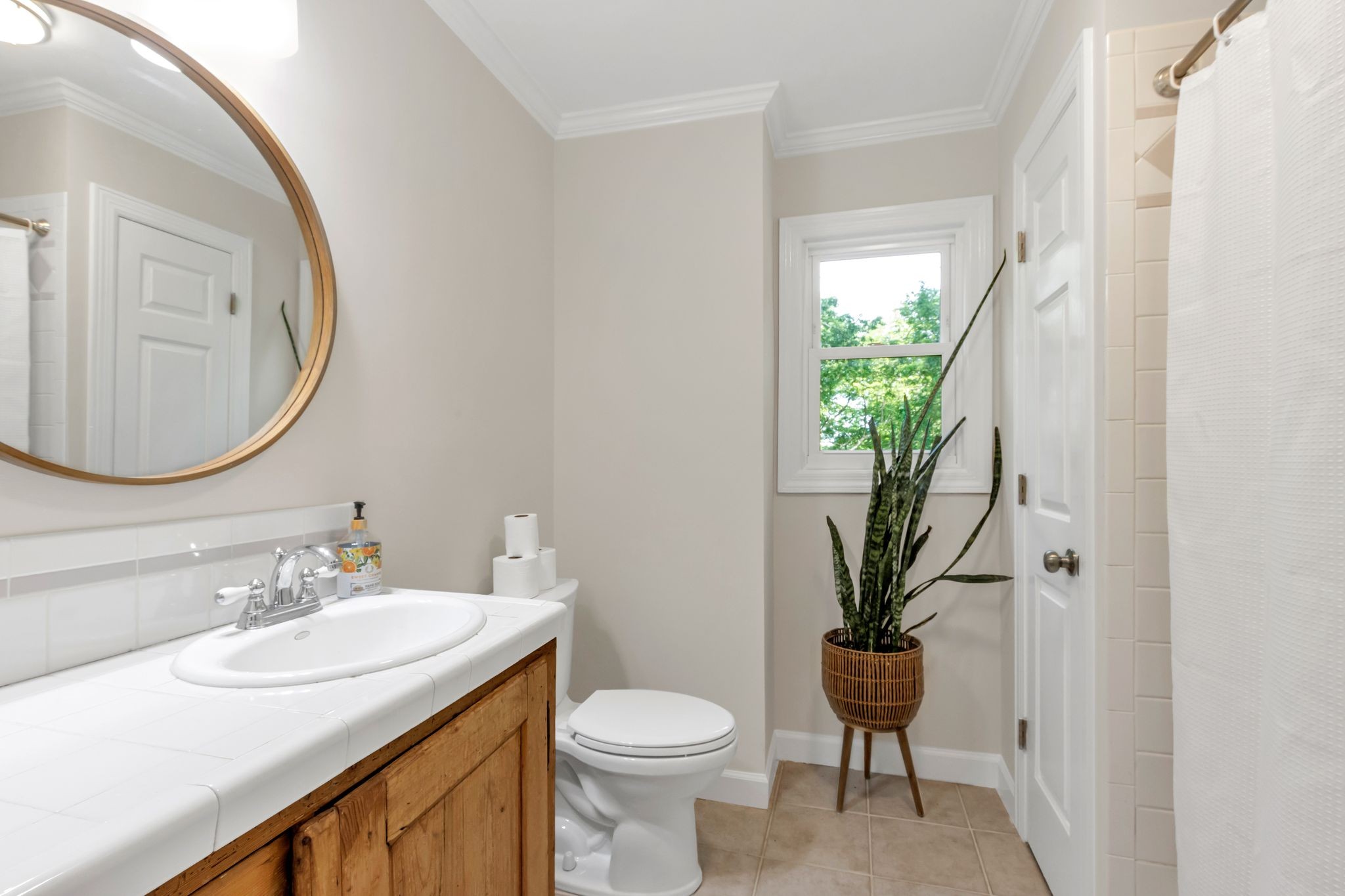 2248 Racquet Club Drive Murfreesboro, TN 37128 - Photo 24 of 41 a bathroom with a sink toilet and a mirror