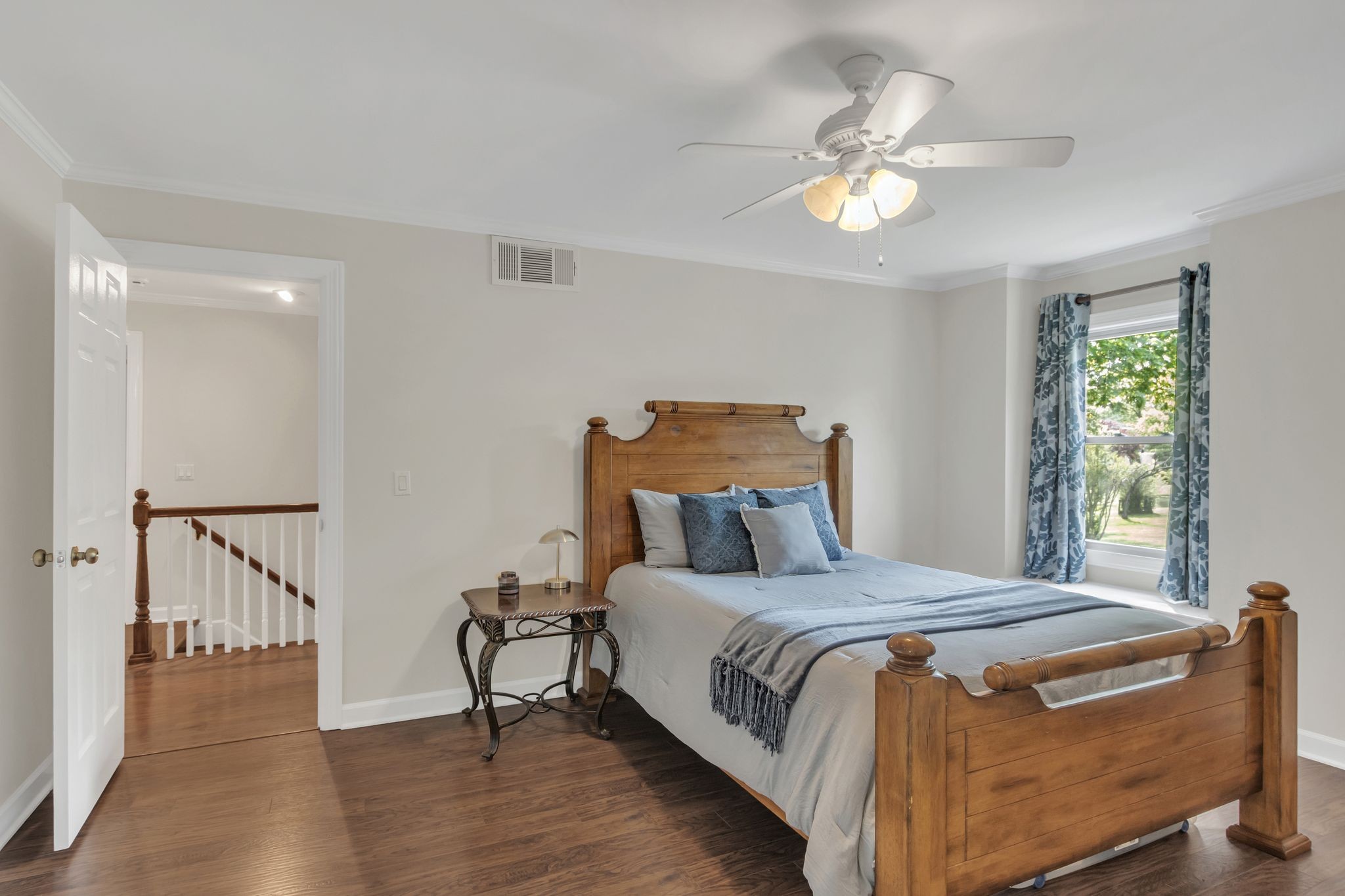 2248 Racquet Club Drive Murfreesboro, TN 37128 - Photo 25 of 41 a bedroom with a bed and a chandelier