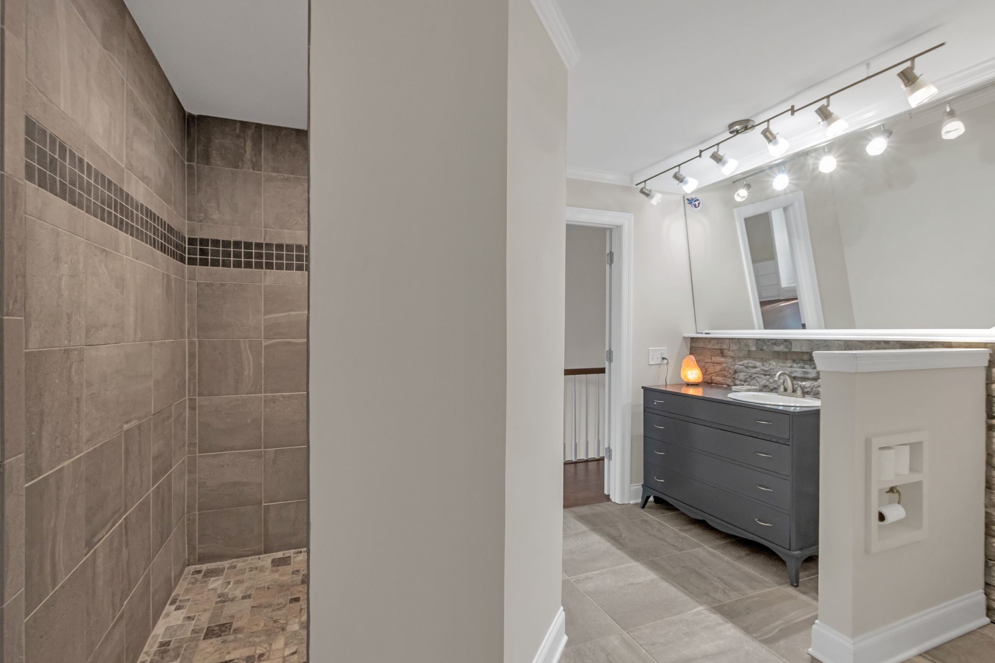 2248 Racquet Club Drive Murfreesboro, TN 37128 - Photo 27 of 41 a bathroom with a mirror and a shower