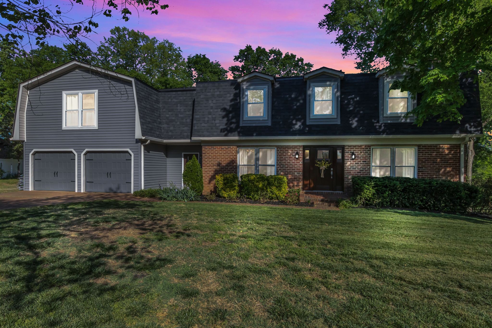 2248 Racquet Club Drive Murfreesboro, TN 37128 - Photo 40 of 41 a front view of a house with a yard