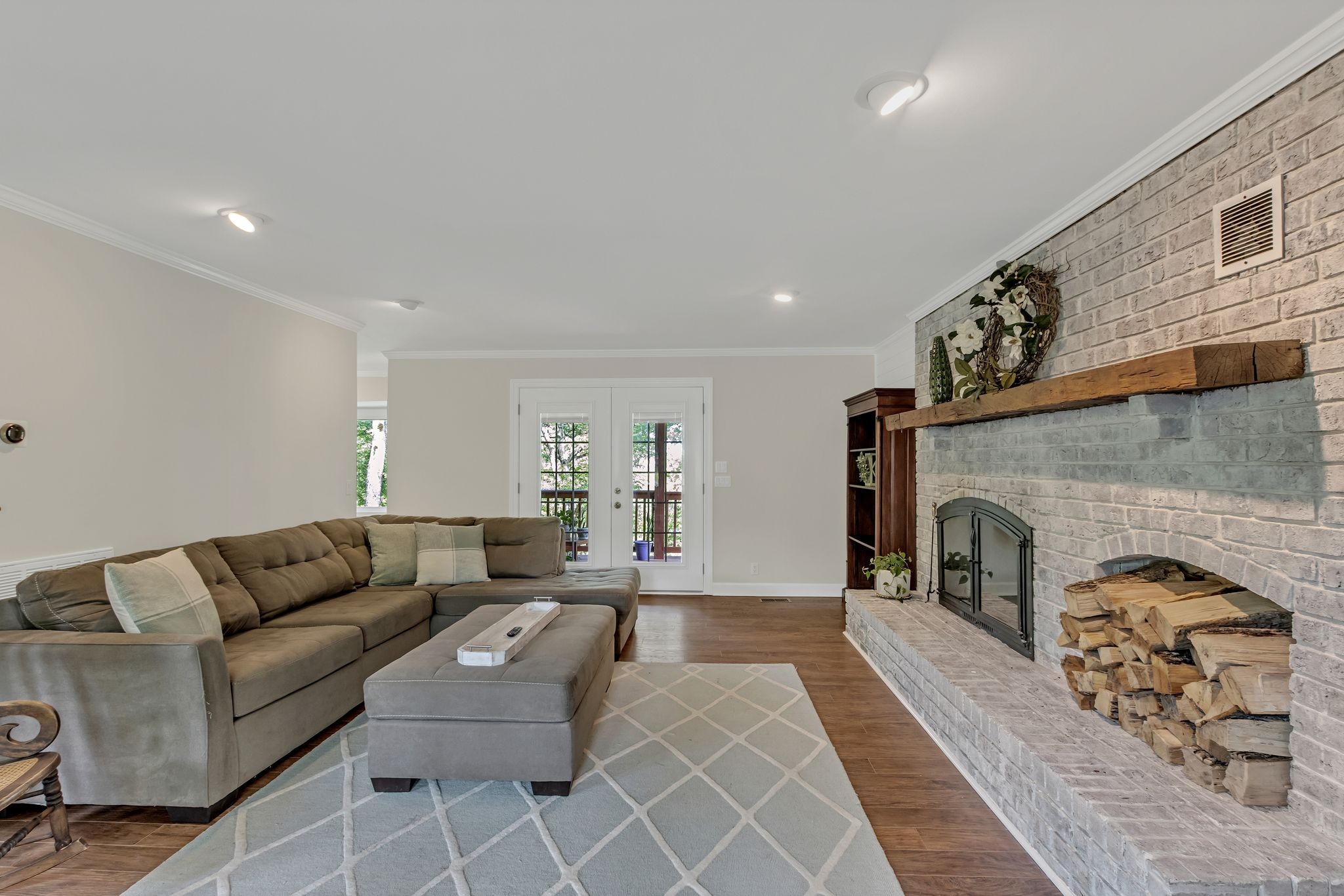 2248 Racquet Club Drive Murfreesboro, TN 37128 - Photo 7 of 41 a living room with furniture a fireplace with wooden floor