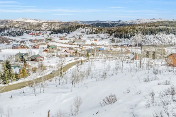 a view of mountains and city