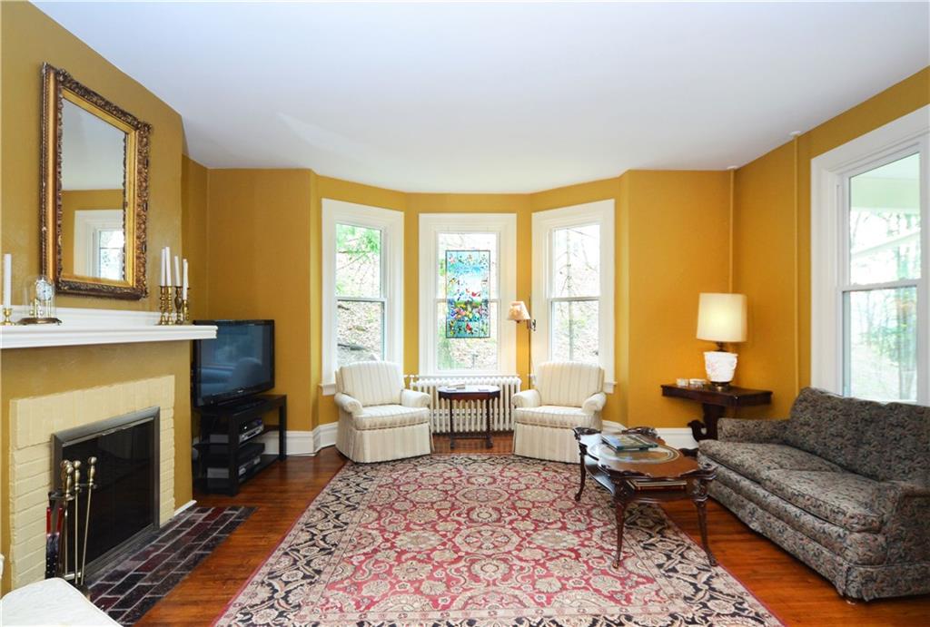 520 Sycamore Road Sewickley, PA 15143 - Photo 4 of 24 Decorative fireplace, refinished wood flooring, double pane windows. 18x17