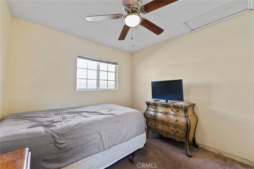 5729 Juarez Avenue Whittier, CA 90606 - Photo 17 of 42 a bedroom with bed and window