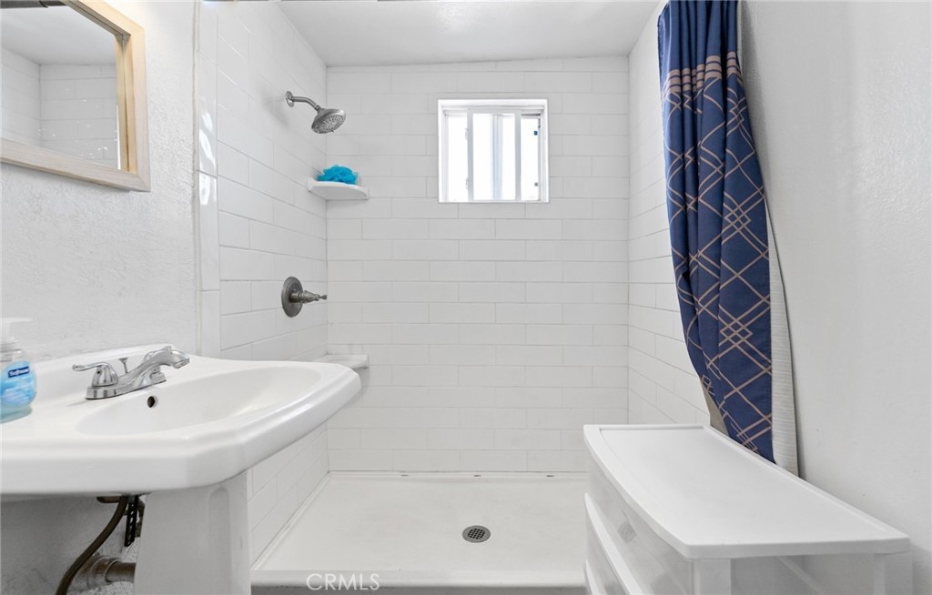 5729 Juarez Avenue Whittier, CA 90606 - Photo 23 of 42 a bathroom with a sink a toilet and shower