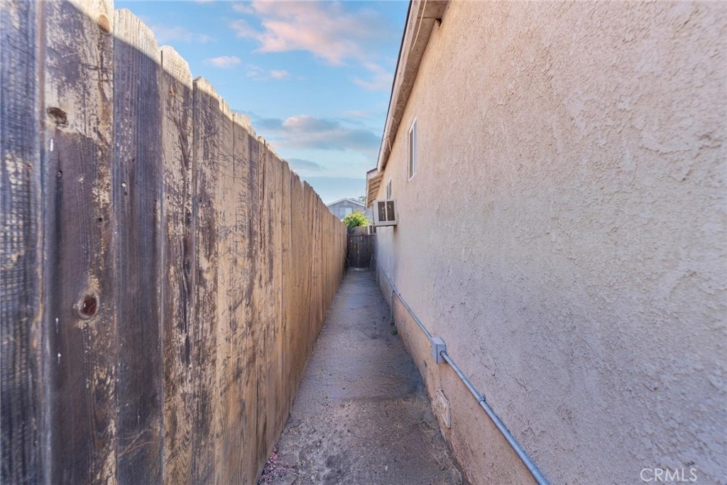 5729 Juarez Avenue Whittier, CA 90606 - Photo 31 of 42 a view of a pathway gate with wooden walls