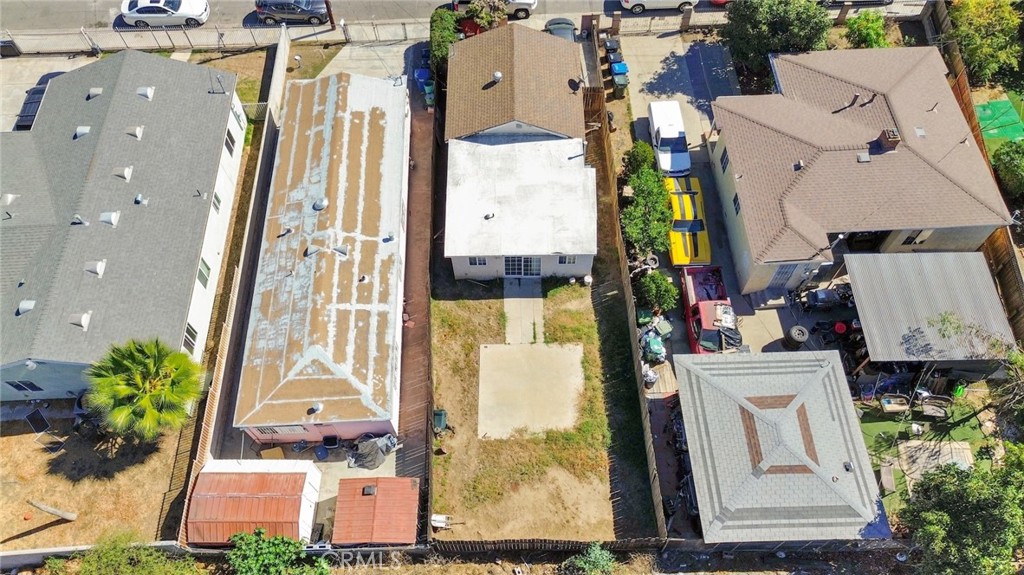 5729 Juarez Avenue Whittier, CA 90606 - Photo 33 of 42 an aerial view of a residential apartment building with a yard