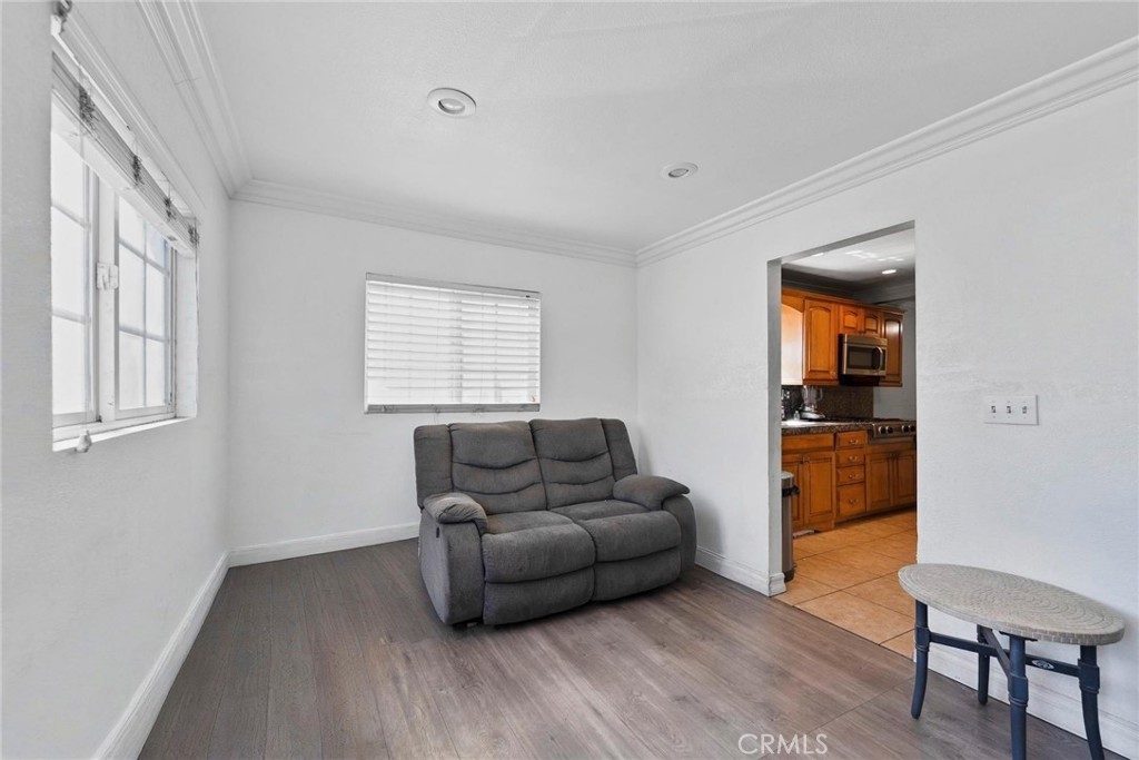 5729 Juarez Avenue Whittier, CA 90606 - Photo 10 of 42 a living room with furniture and a window