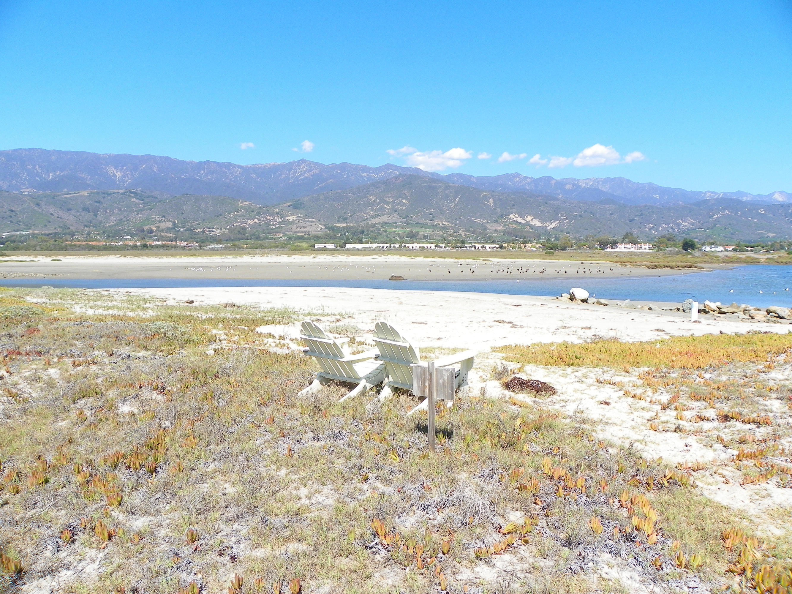 501 Sand Point Road Carpinteria, CA 93013 - Photo 5 of 19 a view of an ocean and a mountain