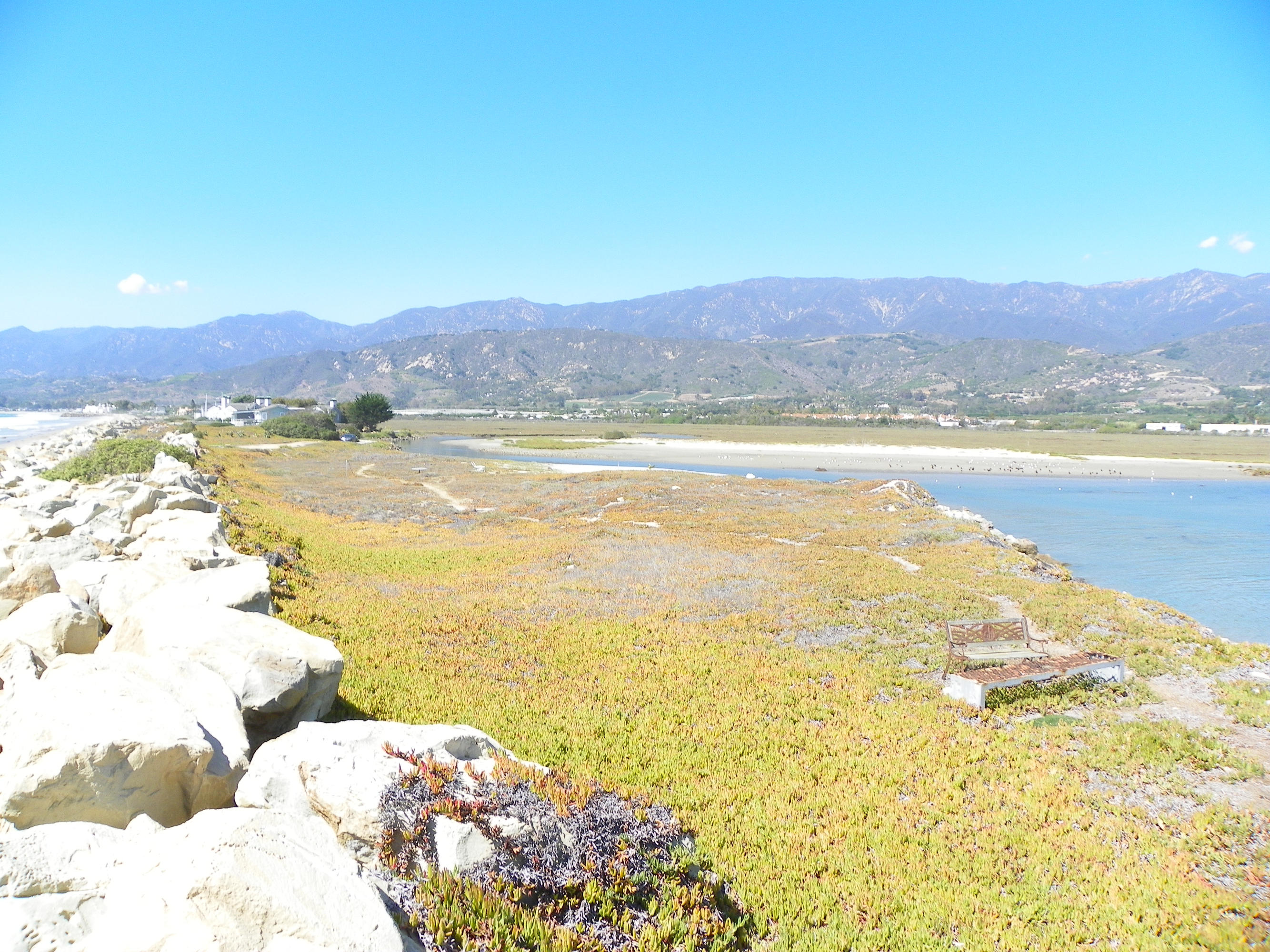 501 Sand Point Road Carpinteria, CA 93013 - Photo 7 of 19 a view of an ocean and a mountain