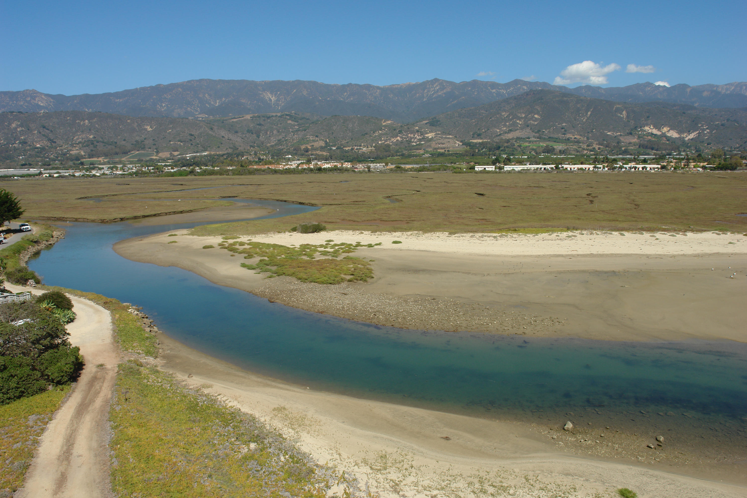501 Sand Point Road Carpinteria, CA 93013 - Photo 8 of 19 a view of an ocean and a mountain