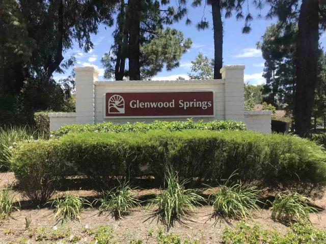 a sign on the side of the road