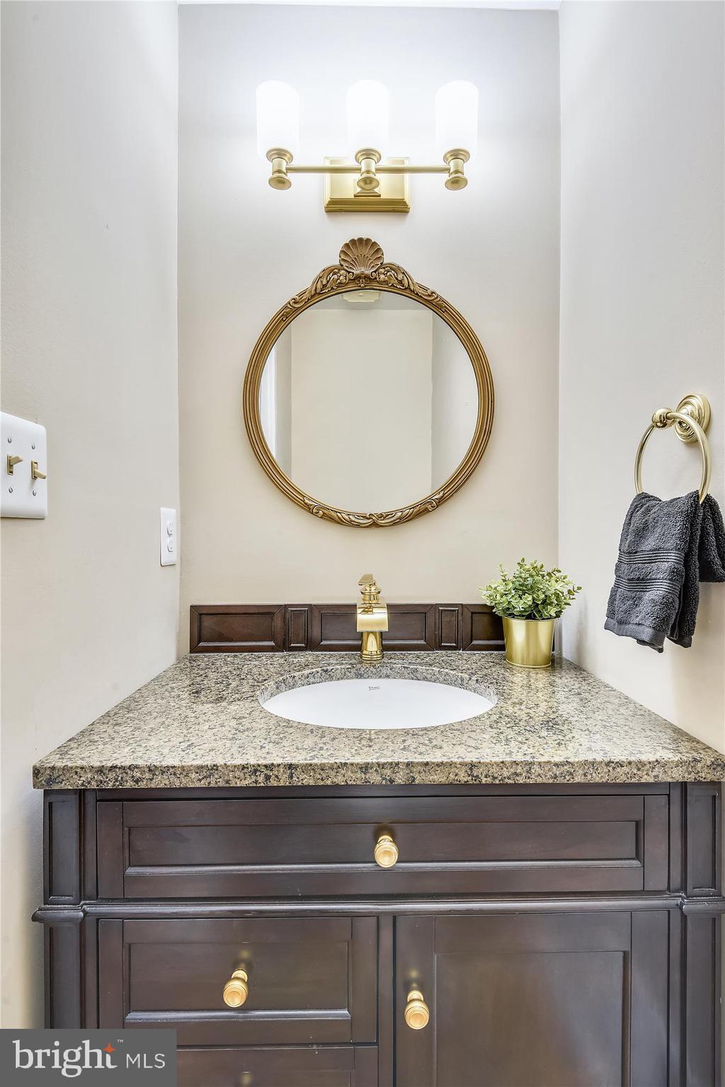 11328 Dockside Circle Reston, VA 20191 - Photo 19 of 44 Renovated main floor powder room, off Foyer
