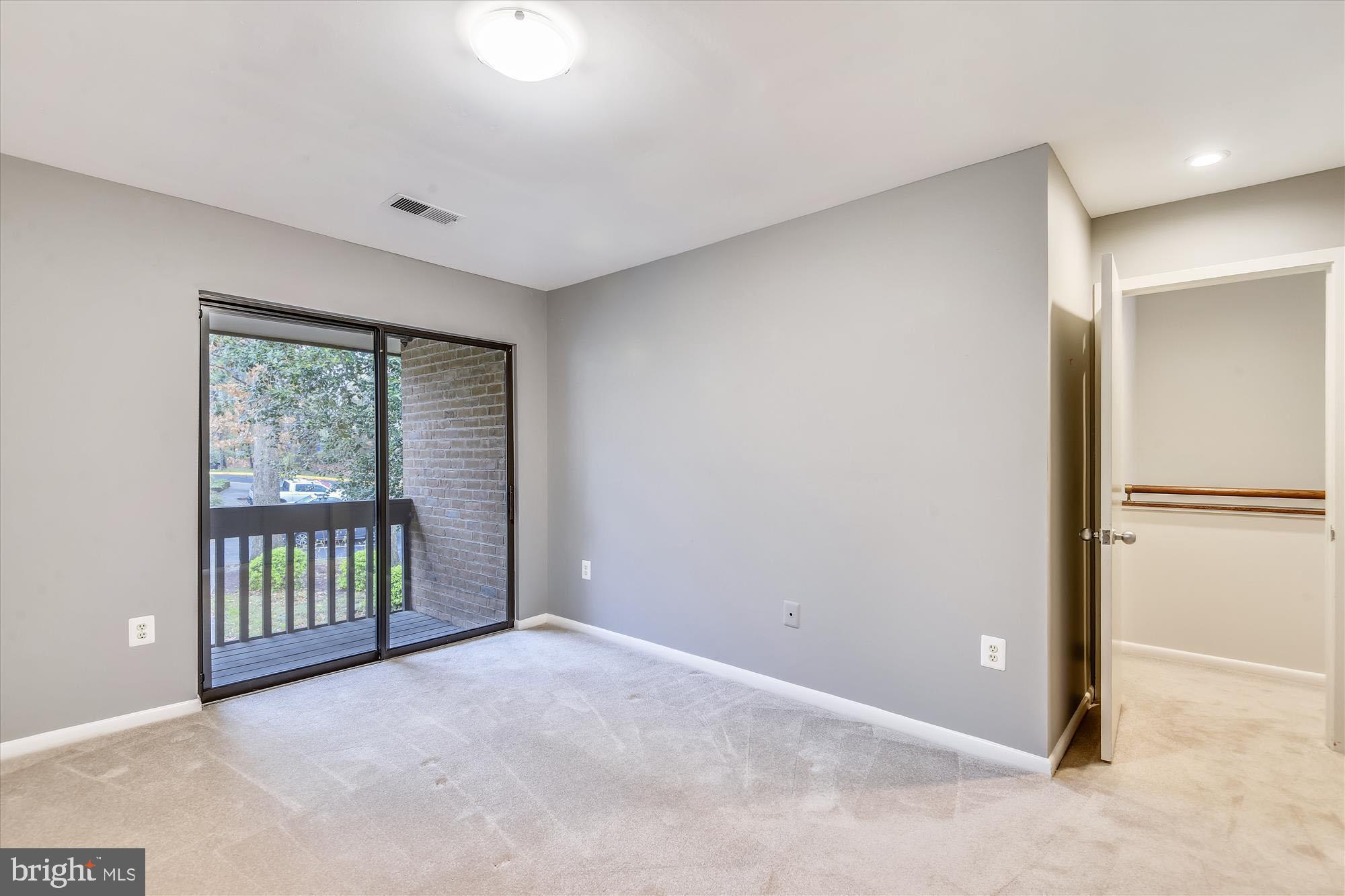 11328 Dockside Circle Reston, VA 20191 - Photo 26 of 44 Bedroom #2 with private balcony