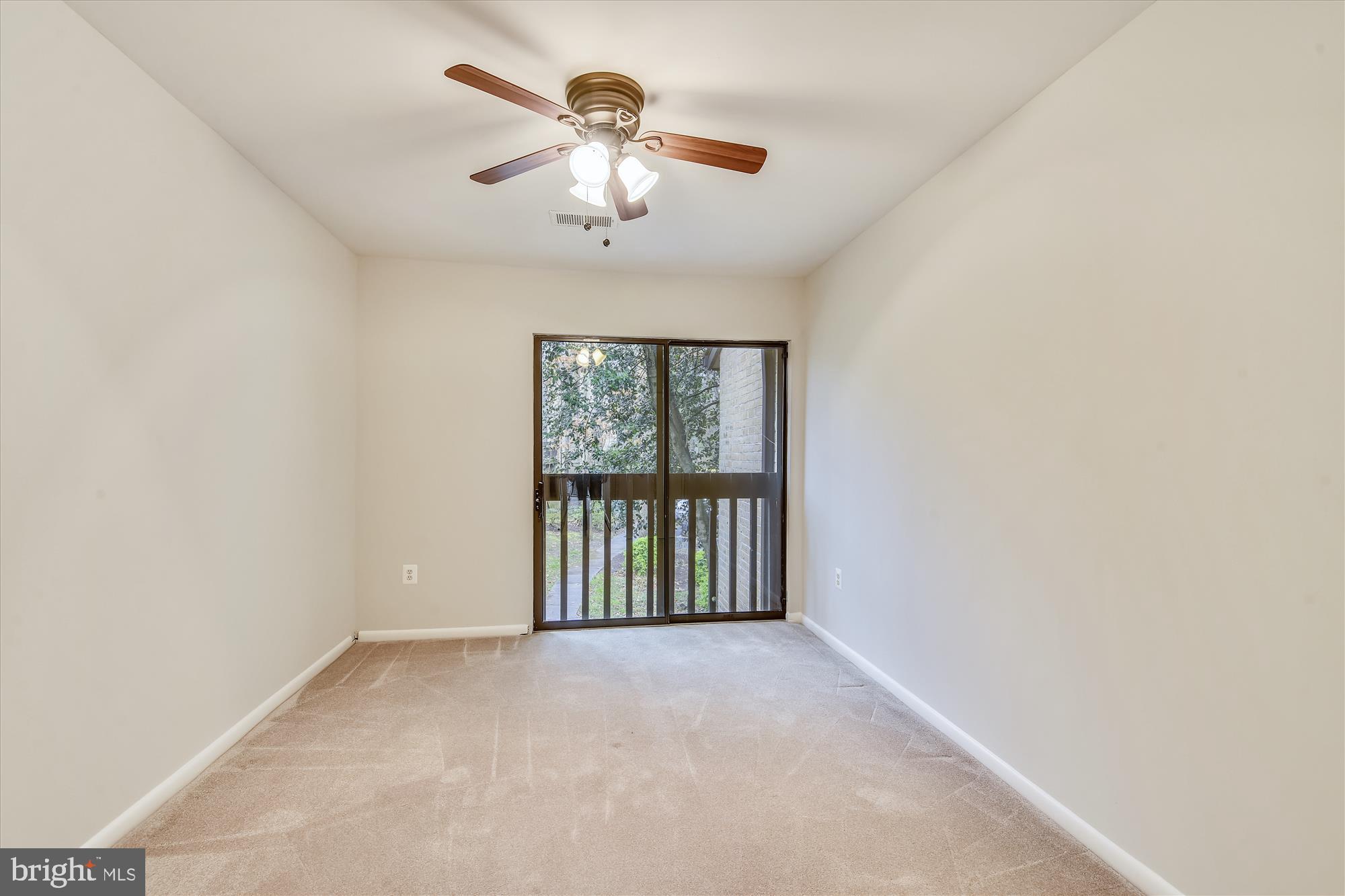 11328 Dockside Circle Reston, VA 20191 - Photo 28 of 44 Bedroom #3, ceiling fan, SGD for fresh breezes