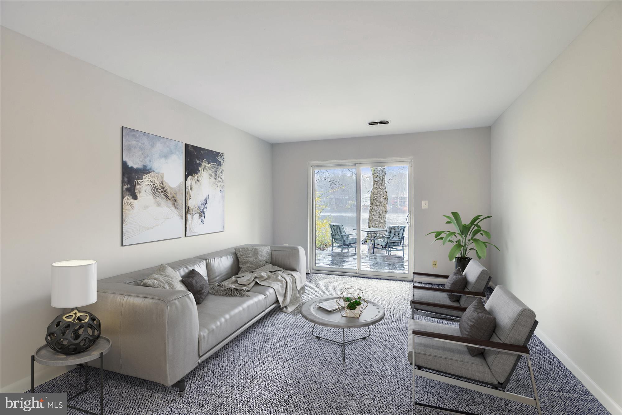 11328 Dockside Circle Reston, VA 20191 - Photo 5 of 44 Family Room leads out to large lakeside patio