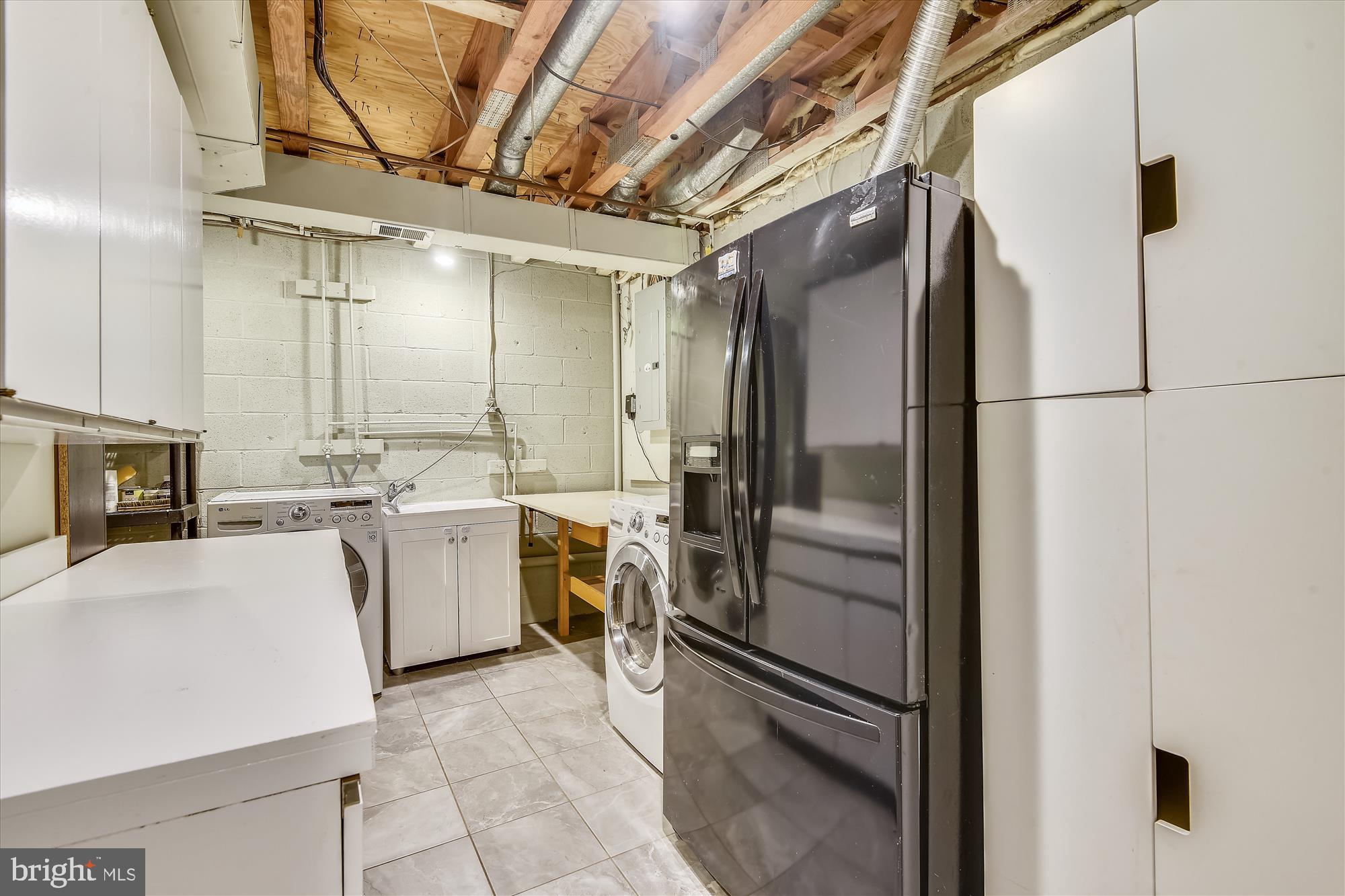 11328 Dockside Circle Reston, VA 20191 - Photo 41 of 44 2nd full-size W/D. Fridge as-is.