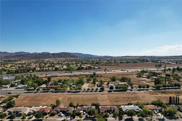 a view of a yard covered with snow