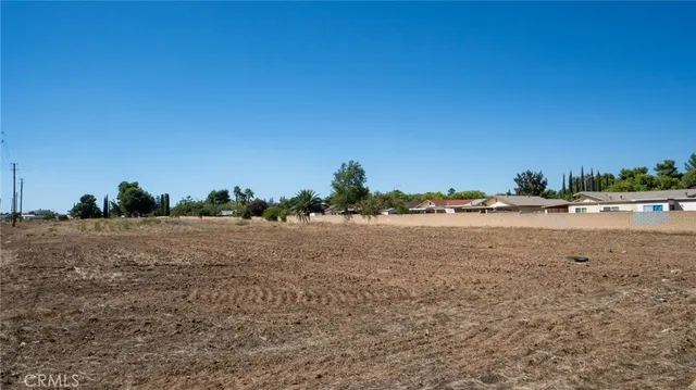 a view of a road with a building in the background