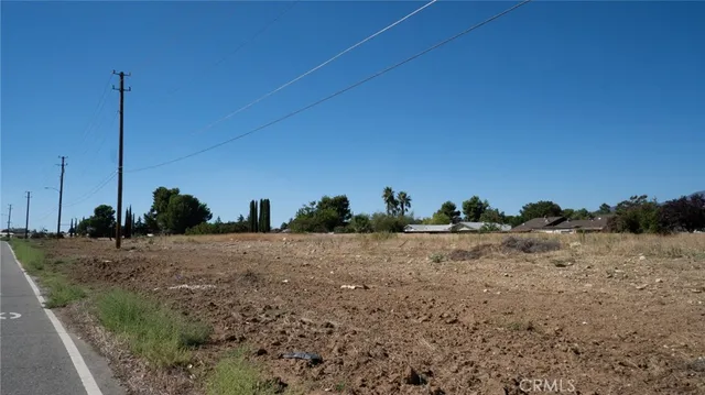 a view of a road with a building in the background