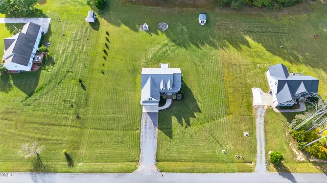 a view of a yard with an outdoor space