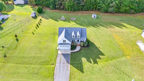 a view of a lake with a house