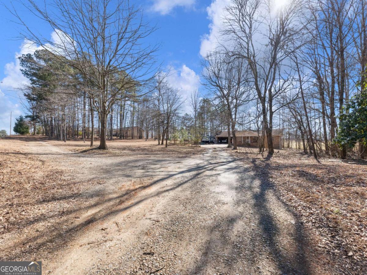 5539 McEver Road Flowery Branch, GA 30542 - Photo 17 of 41 a view of road with covered with snow