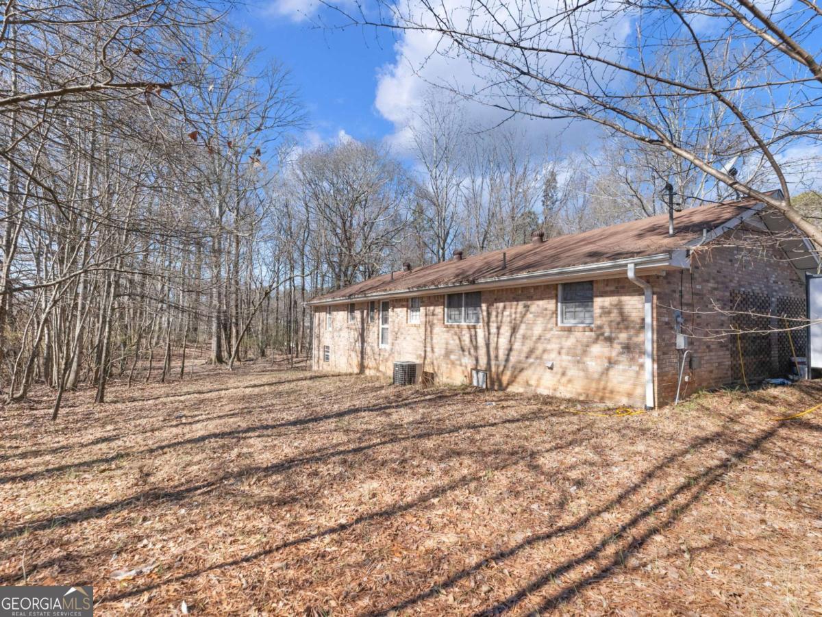 5539 McEver Road Flowery Branch, GA 30542 - Photo 28 of 41 a view of a backyard