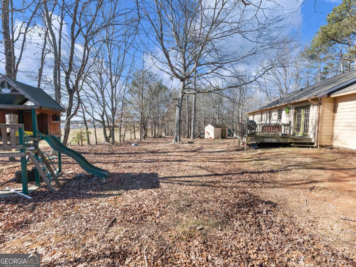 5539 McEver Road Flowery Branch, GA 30542 - Photo 6 of 41 a view of road with yard