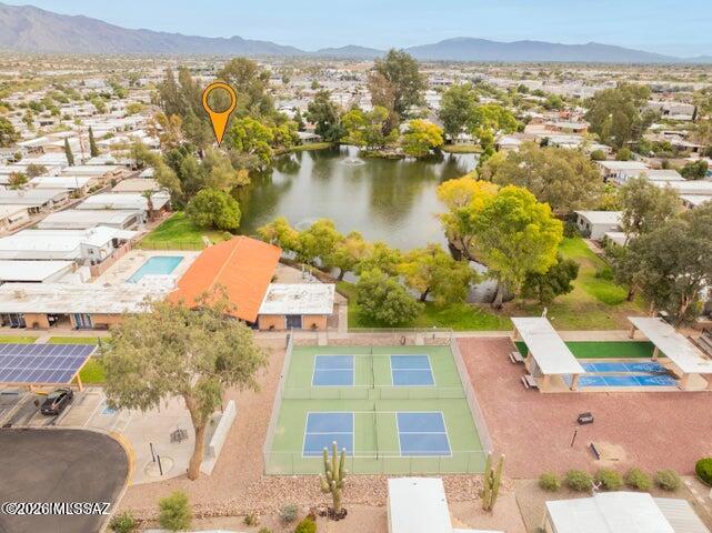4550 North Flowing Wells Road, Unit 65 Tucson, AZ 85705 - Photo 14 of 50 an aerial view of residential houses with outdoor space