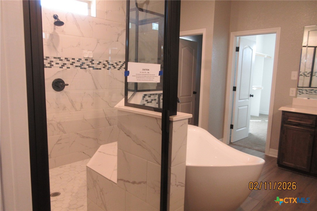 7623 Palladium Loop Killeen, TX 76542 - Photo 15 of 40 a bathroom with a shower