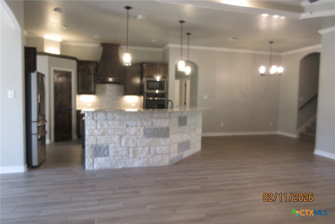 7623 Palladium Loop Killeen, TX 76542 - Photo 22 of 40 a view of a room with a wooden floor