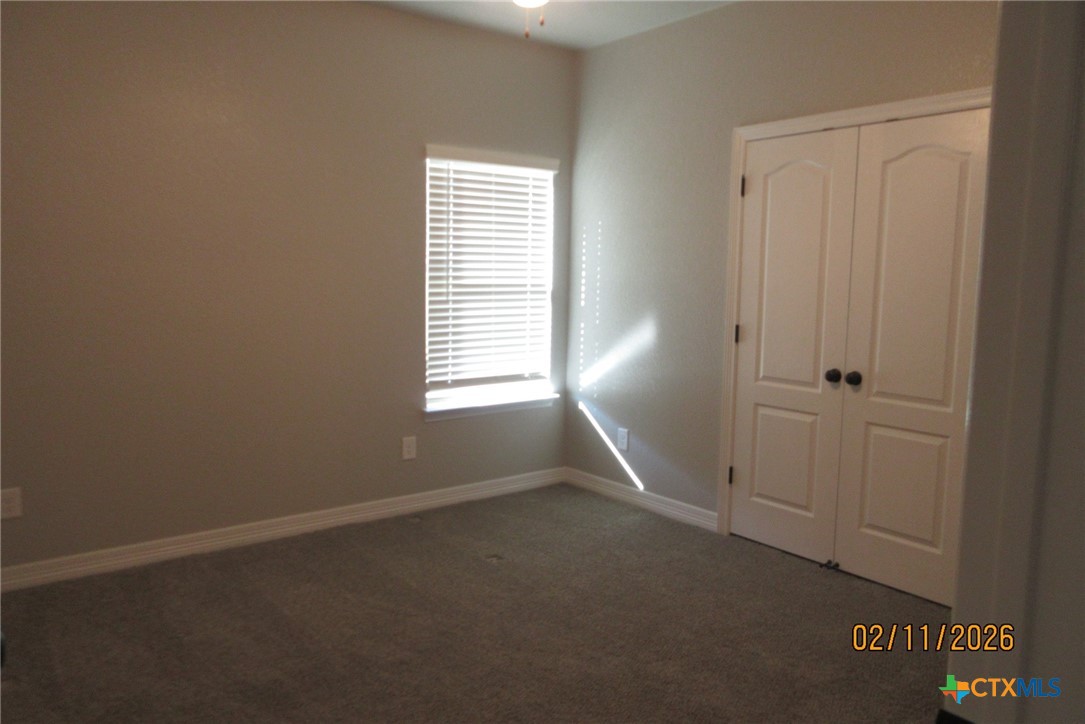 7623 Palladium Loop Killeen, TX 76542 - Photo 26 of 40 an empty room with windows