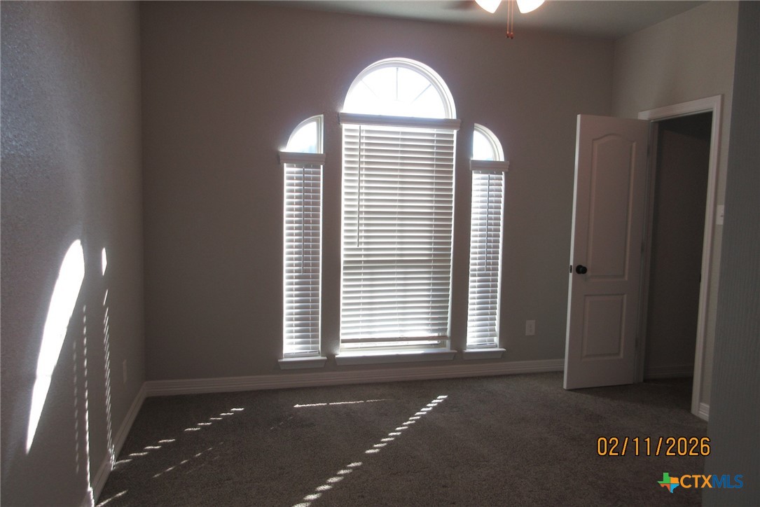 7623 Palladium Loop Killeen, TX 76542 - Photo 27 of 40 an empty room with windows
