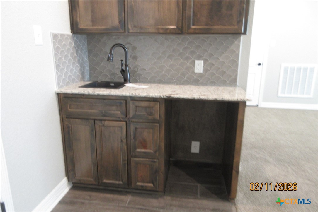 7623 Palladium Loop Killeen, TX 76542 - Photo 36 of 40 a close view of sink and tap