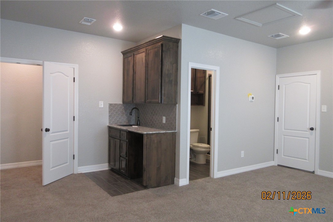 7623 Palladium Loop Killeen, TX 76542 - Photo 37 of 40 an empty room with closet and windows